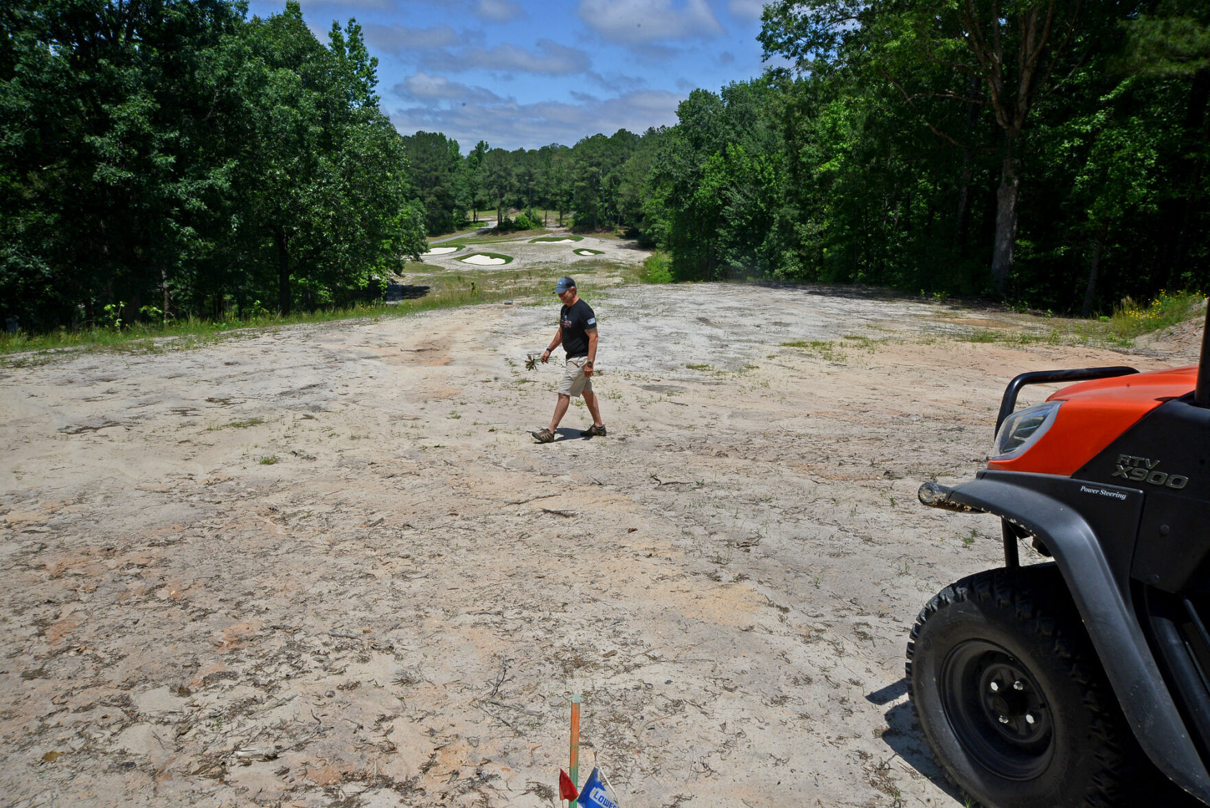 Chris Dwiggins, golf superintendent at Woodlake, on the 8th hole of the community’s Ellis Maples-designed course